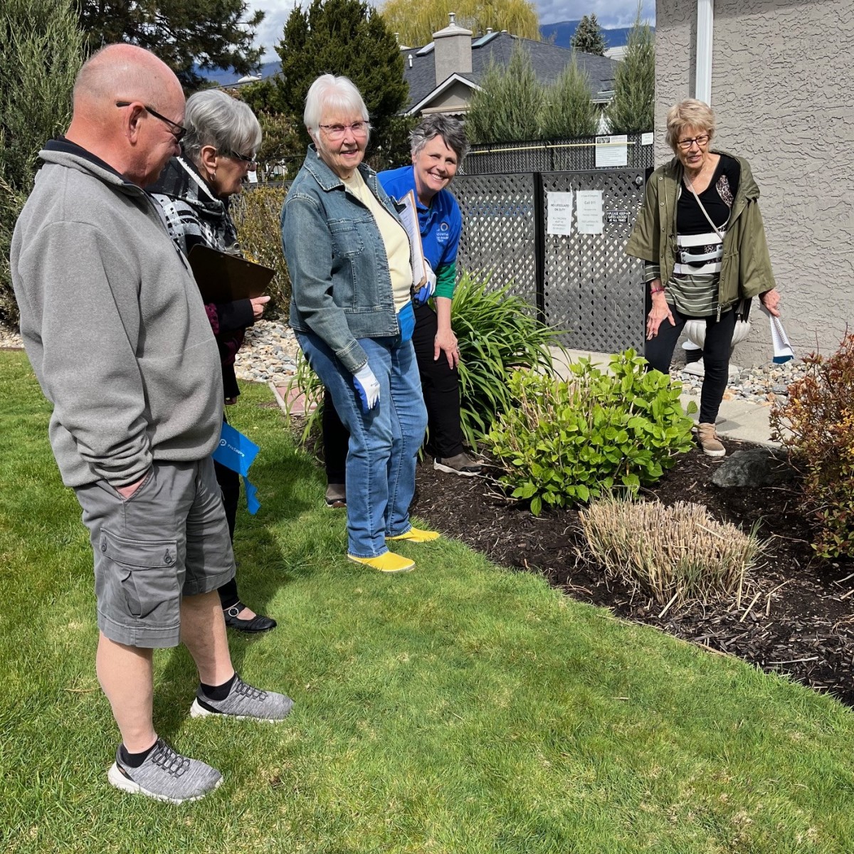 Meadows residents show Shauna Burnell, Kelowna Water Smart, some new drought-tolerant plantings. 